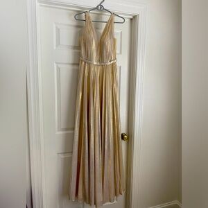 New without tags! Cinderella Divine Gold side slit dress.
